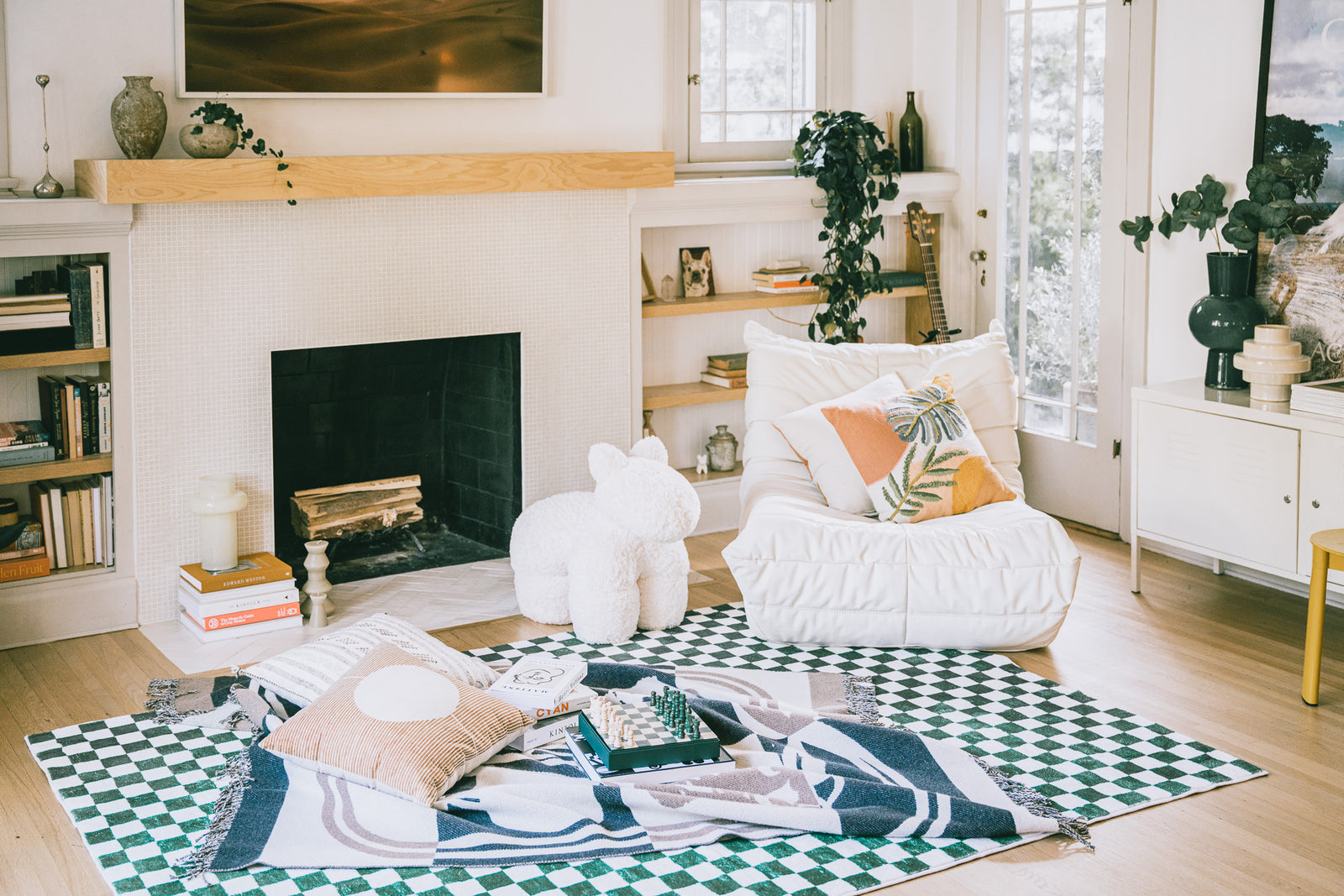 LanySpace Green Checkered Rug placed by a fireplace