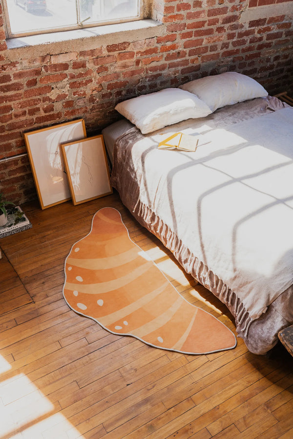 Buttery Orange Croissant Rug by Petra Lizde