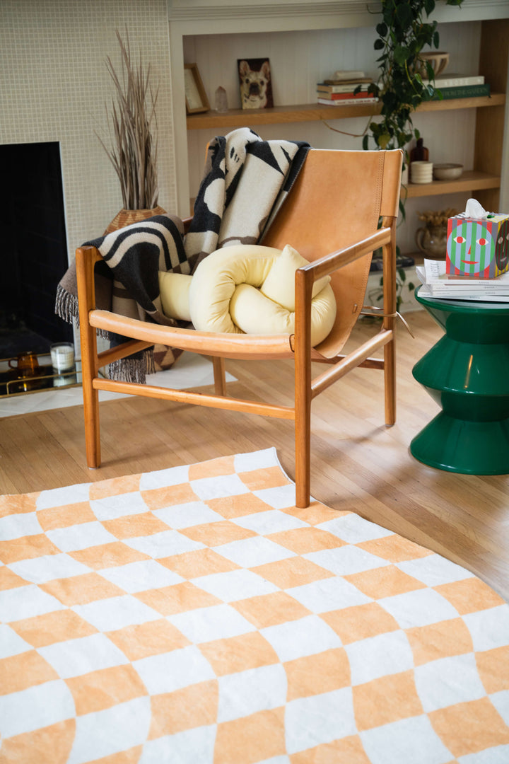 A Retro Chair on the LanySpace Yellow Wavy Checkered Rug
