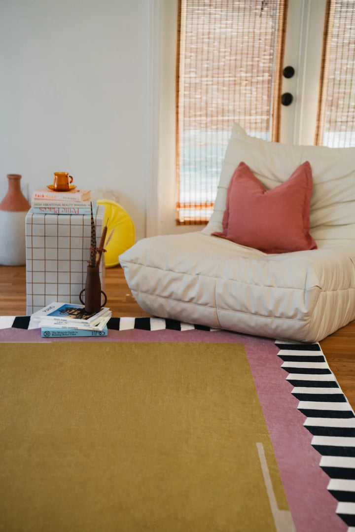 Cozy nook with Keyboard Boarded Area Rug (7' x 10') in the living room